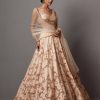 Bridal Mala u0026 Kinnary | Beige Jaal Baroque Lehenga Set